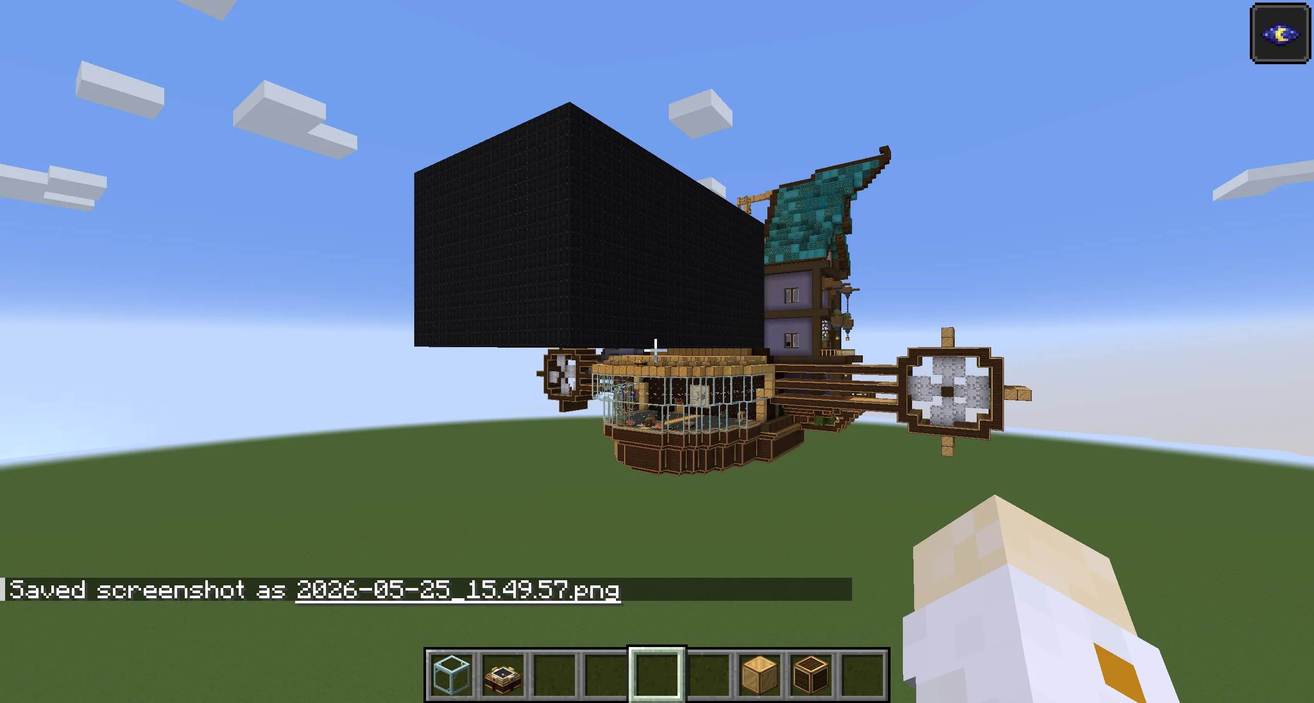 Ghibli Style Airship house with Black Envelope, Brass Casing, Brass Block, Framed Glass, Gray Terracotta, Copycat Stairs, Black Terracotta, and Dark Oak Stairs, visible proportions, and a 77 x 40 x 69 schematic footprint.